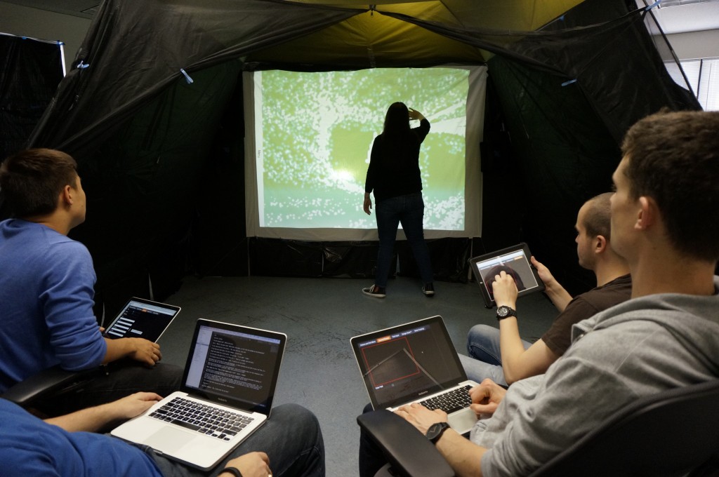 We prototyped an immersive environment by using a large, dark tent. "Wizards" controlled the experience outside of the tent. 