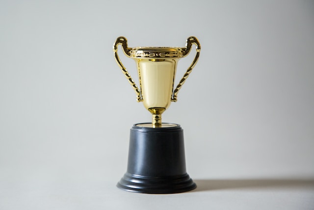 gold trophy on white background